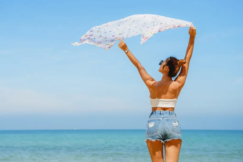 Back view of sexy body woman on paradise tropical beach
