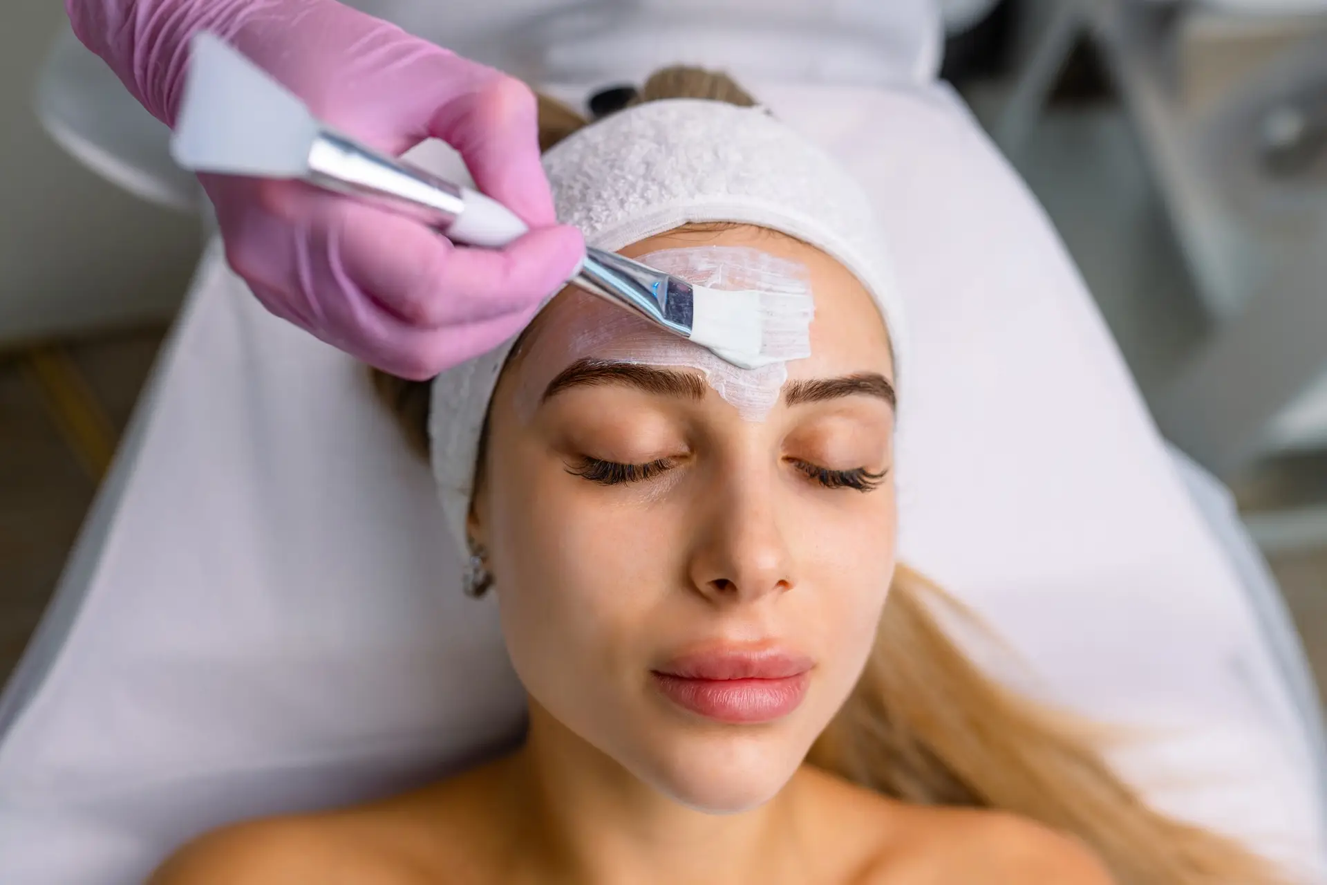 facial rejuvenation treatment with cream at the spa
